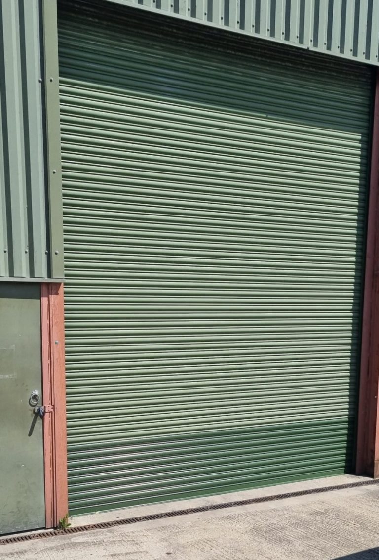 Vehicle impact to industrial roller shutter in Oxford